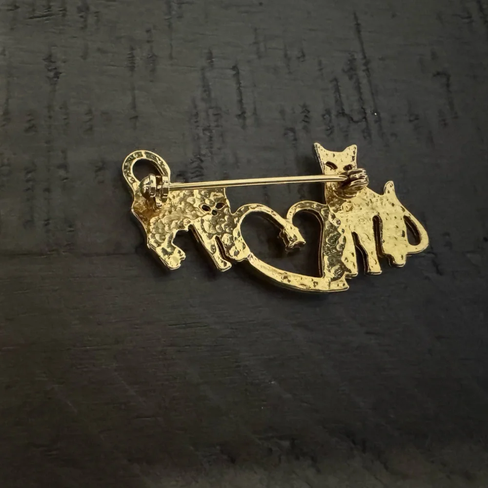 Vintage Gold Cat Brooch with Heart Design